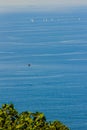 Tropical beach landscape panorama. Beautiful turquoise ocean waives with boats and sandy coastline from high view point. Kata and Royalty Free Stock Photo