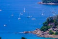 Tropical beach landscape panorama. Beautiful turquoise ocean waives with boats and sandy coastline from high view point. Kata and Royalty Free Stock Photo