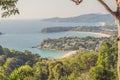 Tropical beach landscape panorama. Beautiful turquoise ocean waives with boats and sandy coastline from high view point. Kata and Royalty Free Stock Photo