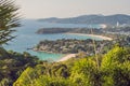 Tropical beach landscape panorama. Beautiful turquoise ocean waives with boats and sandy coastline from high view point. Kata and Royalty Free Stock Photo