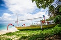 Tropical beach and local boat in Bali