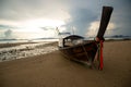 Tropical beach, long tail boats,golden sunset, gulf of Thailand,Krabi Royalty Free Stock Photo