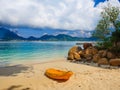 Tropical beach with orange kayak, summer vacation concept, Seychelles Royalty Free Stock Photo