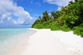 Tropical beach with palm trees, Maldives Royalty Free Stock Photo