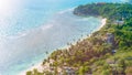 Tropical beach with palms on a windy day Royalty Free Stock Photo