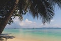 Tropical Beach with Palmtree. White sand and turquoise water in an Island in Thailand. Royalty Free Stock Photo