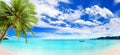 Tropical beach panorama, exotic island landscape panoramic view, green palm tree leaves, boat on turquoise sea water, ocean waves Royalty Free Stock Photo