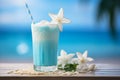 Tropical beach paradise with a refreshing summer cocktail, palm trees, shells, and starfish Royalty Free Stock Photo