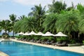 Tropical beach resort hotel swimming pool Royalty Free Stock Photo