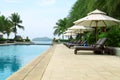 Tropical beach resort hotel swimming pool Royalty Free Stock Photo