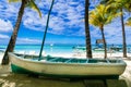 Tropical beach scenery with old boat.Mauritius island