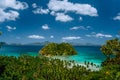 Tropical beach scenery with palm trees, island and blue lagoon. El Nido, Palawan, Philippines Royalty Free Stock Photo