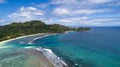 Tropical beach with sea and palm taken from drone. Beach and sea photo. Romantic beach aerial view