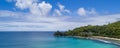 Tropical beach with sea and palm taken from drone. Beach and sea photo. Romantic beach aerial view