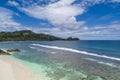 Tropical beach with sea and palm taken from drone. Beach and sea photo. Romantic beach aerial view