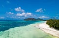 Tropical beach with sea and palm taken from drone. Beach and sea photo. Romantic beach aerial view