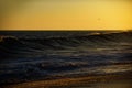 Tropical beach with smooth wave and sunset sky abstract background. Beach sunrise over the tropical sea. Colorful sunset Royalty Free Stock Photo