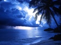 tropical beach storm, blue tones, lightning, dramatic ocean view Royalty Free Stock Photo