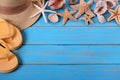 Tropical beach summer starfish flip flops background border blue wood Royalty Free Stock Photo