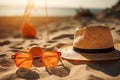 Tropical beach with sunbathing accessories, sunglasses, summer holiday concept background Royalty Free Stock Photo