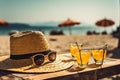 Tropical beach with sunbathing accessories, sunglasses, summer holiday concept background Royalty Free Stock Photo