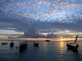 Long tail boats on tropical beach at sunrise. Koh Lipe island-Thailand