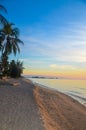 Tropical beach sunrise seascape with Palm trees, Thailand