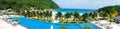 Tropical beach and swimming pool panoramic background Royalty Free Stock Photo