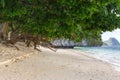 Tropical beach with trees and white sand. Seascape with isles on background. Vacation and relax background. Tropic paradise. Royalty Free Stock Photo