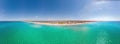 A tropical beach on the turquoise Caribbean Sea. Panoramic long background Beautiful place for summer vacation. Aerial Royalty Free Stock Photo