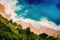 Tropical beach. Turquoise water. White sand beach. Paradise island. View from above looking down the cliff to the beach with blue Royalty Free Stock Photo