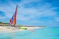 The tropical beach of Varadero in Cuba with a colorful sailboat Royalty Free Stock Photo