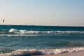 Tropical beach white sand, blue clear ocean water. sea foam on the beach on a sunny day. sea waves on the shore. surf breaking on Royalty Free Stock Photo