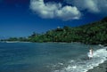 Tropical Beach with Woman in White Dress Royalty Free Stock Photo