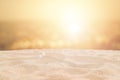 Tropical beautiful seascape view of sand beach and blurred sea with bokeh sunlight reflected on water surface in evening. Royalty Free Stock Photo