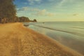 Tropical beautiful seascape view of sand beach and sea wave in twilight time. Royalty Free Stock Photo