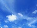 Tropical blue sky background with white cloud trails. Soft white clouds in blue sky of the Caribbean. Textures and Backgrounds of Royalty Free Stock Photo