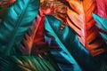 Tropical bright colorful background with exotic painted tropical palm leaves. AI generated