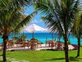 Tropical Caribbean vacation resort. Private beach overlooks turquoise water. Isla Mujeres, Mexico Royalty Free Stock Photo