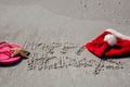 Tropical Christmas at the beach, with happy holidays written in Royalty Free Stock Photo