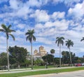 Architecture, tropical City, palm trees, building, beautiful blue sky full of clouds, HDR filter, West Palm, Florida, USA Royalty Free Stock Photo