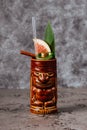 Tropical cocktail served in a tiki style glass