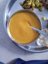 Tropical Delight: A Plate of Rich and Creamy Aamras Made with Fresh Mangoes