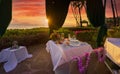 Tropical dining with a sunset