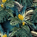 Tropical exotic floral green and blue monstera palm leaves seamless pattern, yellow flowers. Royalty Free Stock Photo