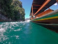 Tropical Thai jungle lake Cheo lan wood boat, wild mountains nature national park ship yacht rocks