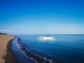 Tropical Fishing Beach Horizon With Traditional Fishing Boat On A Sunny Day Royalty Free Stock Photo