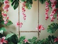 , Tropical flowers background , newborn backdrop with hanging swing with fur or flowers Royalty Free Stock Photo