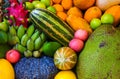 Tropical fruit background. Raw and ripe exotic fruit closeup photo. Vegetarian wallpaper.