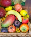 Tropical fruit in a basket.Close up in a sunny day Royalty Free Stock Photo